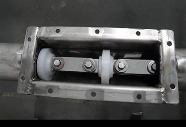 Inlet hopper for tube drag conveyor